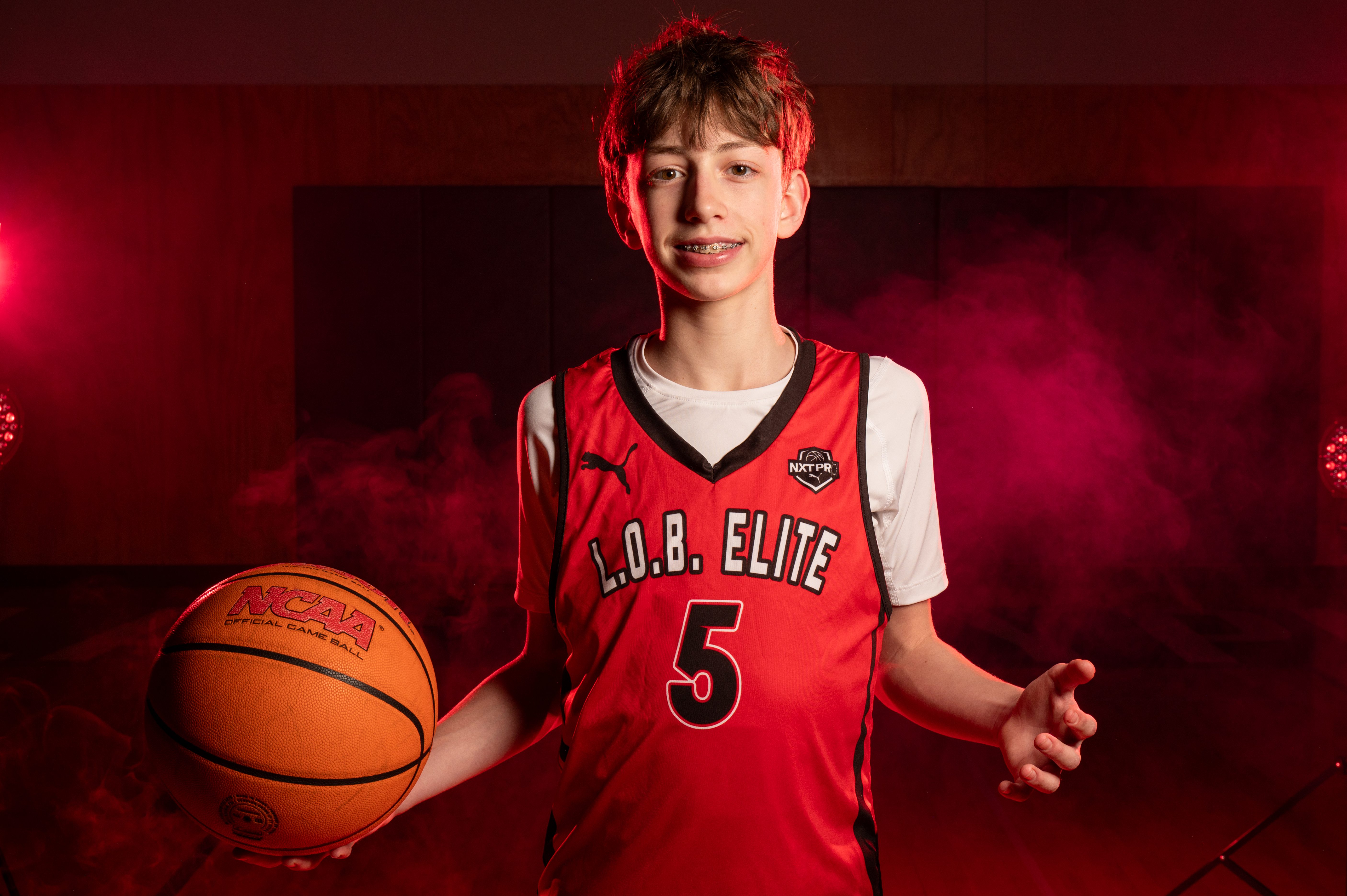 Basketball individual, dramatic lighting, media day pictures.